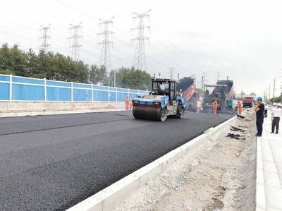 昆陽路越江大橋主線通車 公路與路面工程成果豐碩，年底有望實現行人過橋